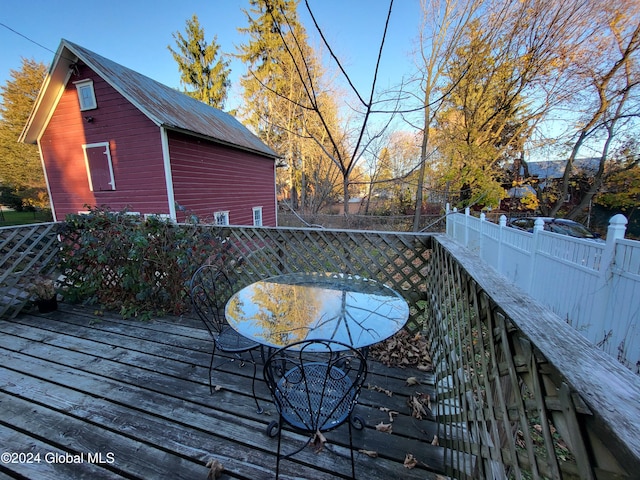 wooden deck featuring a pool