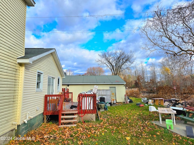 view of yard with a deck