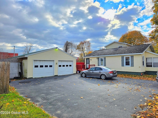 view of side of home with a garage