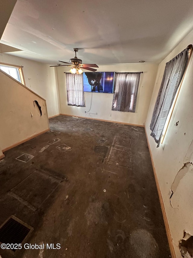 unfurnished room featuring ceiling fan