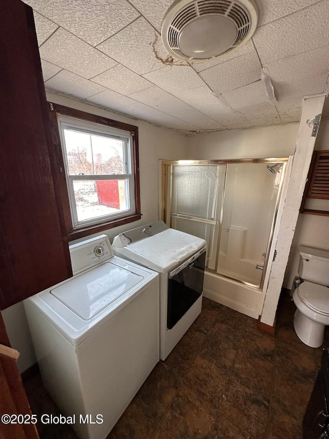 laundry room with washer and clothes dryer