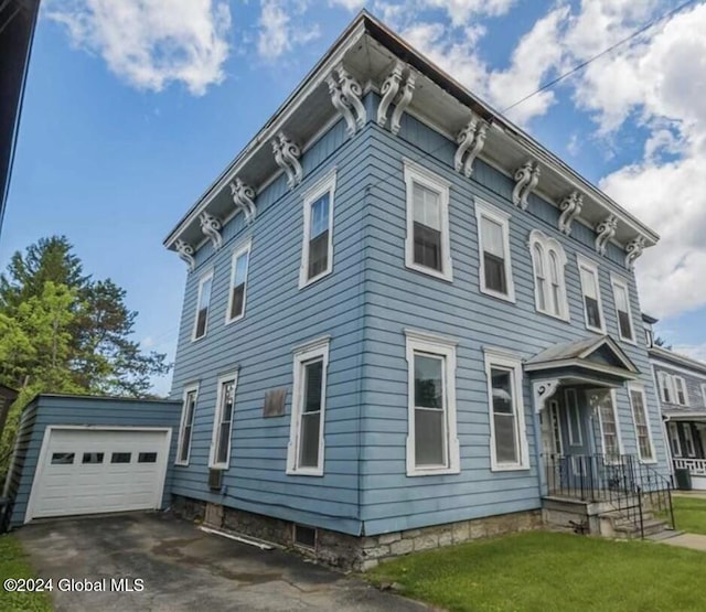 75 E Main St, Johnstown, NY 12095 - view of front of property with a front yard and asphalt driveway