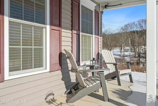 view of snow covered patio