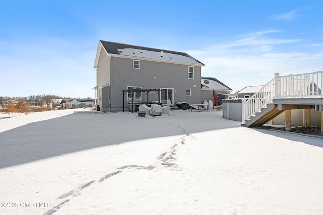 view of snow covered property