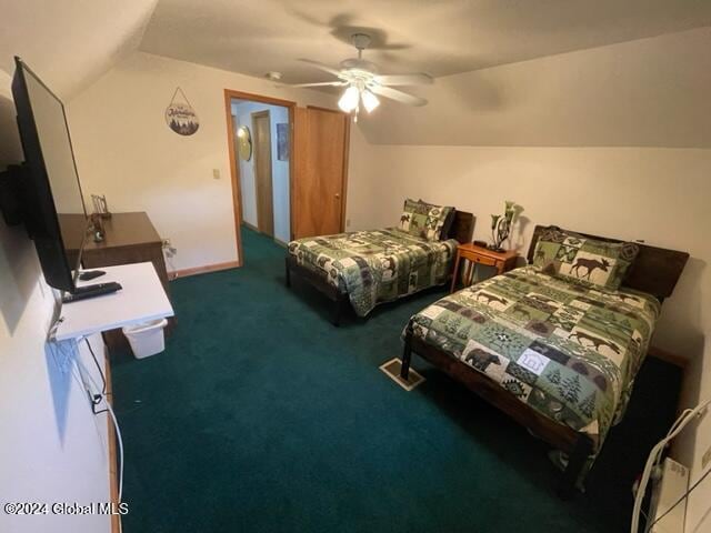 carpeted bedroom featuring ceiling fan and vaulted ceiling