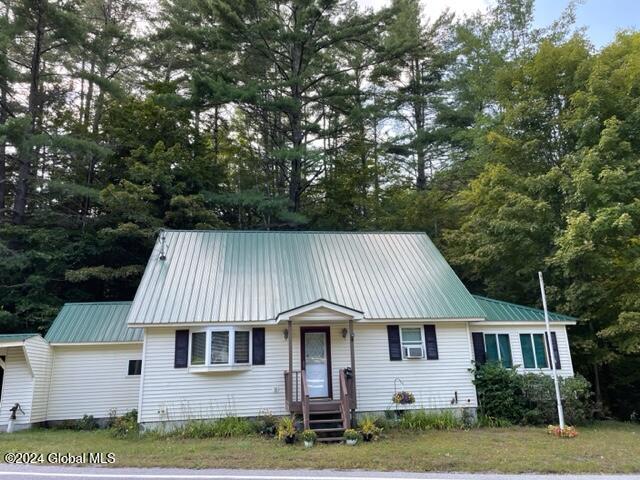 view of front of property with cooling unit