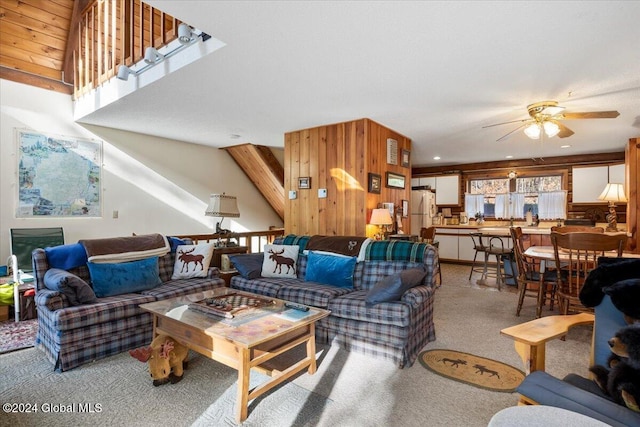 living room featuring ceiling fan and light colored carpet