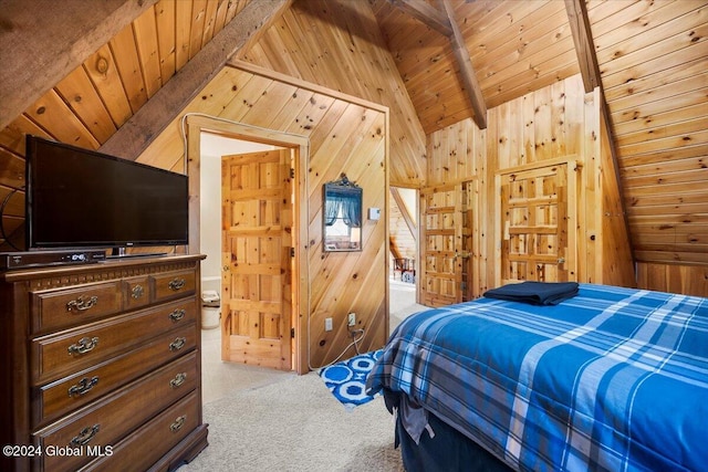 carpeted bedroom featuring beam ceiling, wood walls, and wood ceiling