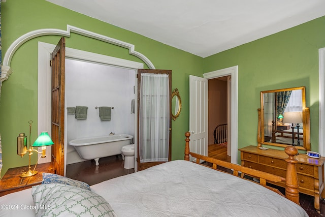 bedroom featuring hardwood / wood-style floors