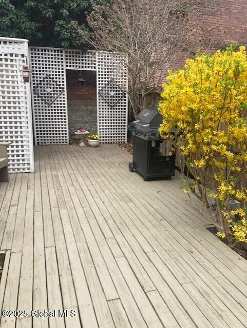 49A Dove St, Albany, NY 12210 - wooden terrace featuring a grill