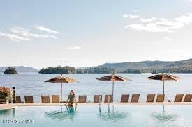 view of pool with a water and mountain view