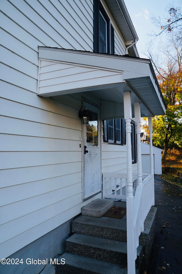 property entrance with a garage