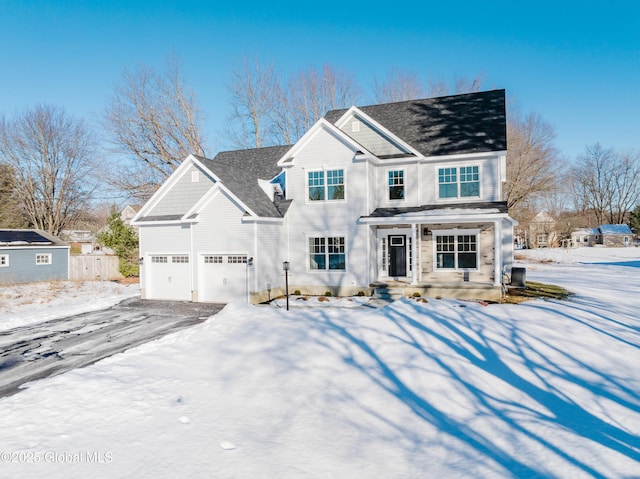 view of front of home with a garage