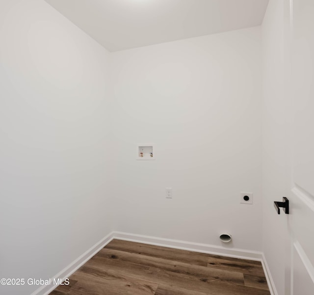 clothes washing area featuring hardwood / wood-style floors, washer hookup, and hookup for an electric dryer