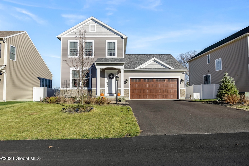 view of property with a front lawn