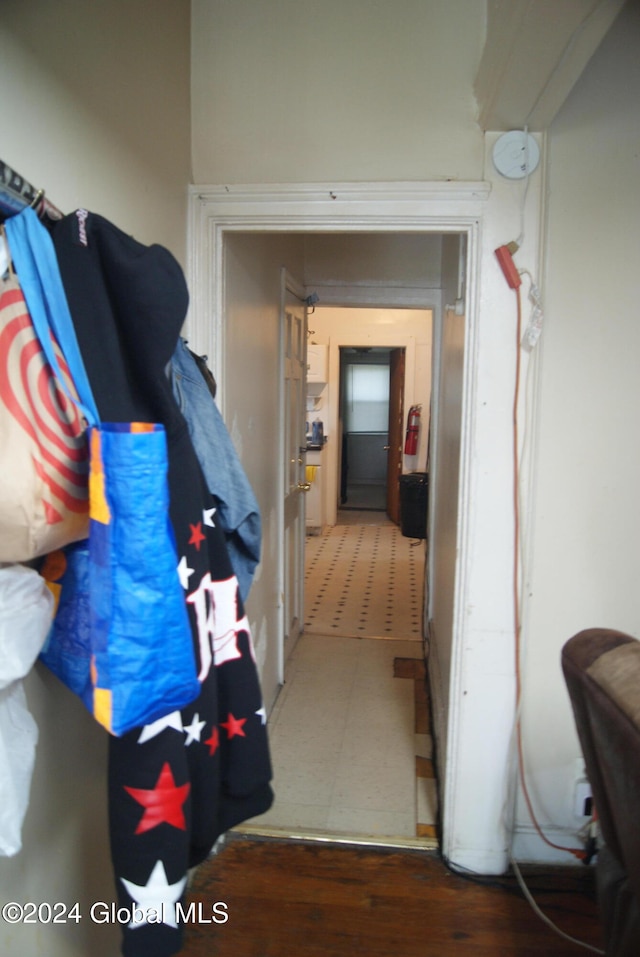 corridor featuring hardwood / wood-style flooring