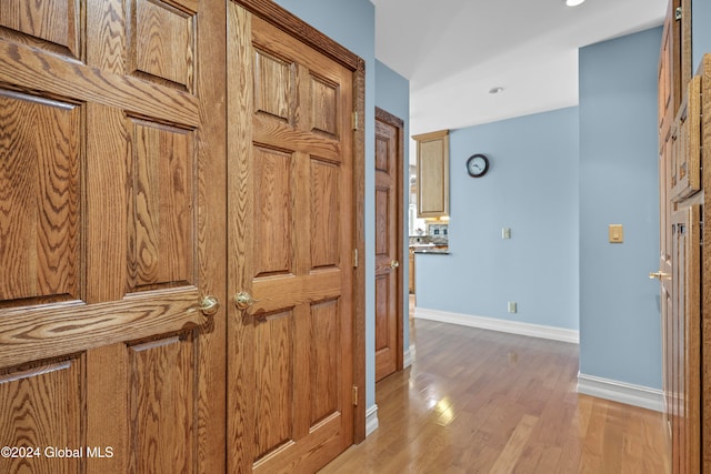 hallway featuring light wood-type flooring