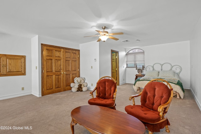 carpeted bedroom with ceiling fan