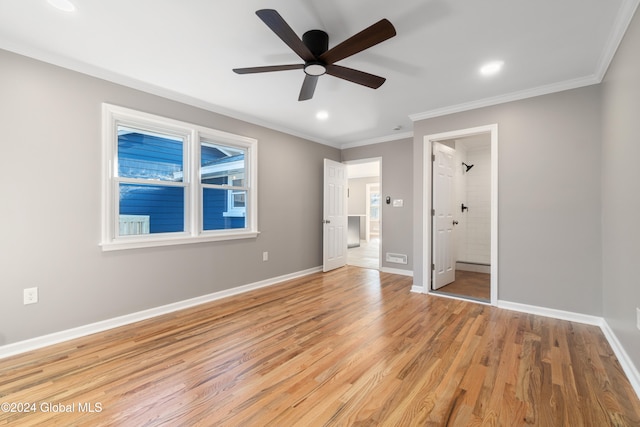 unfurnished bedroom with light hardwood / wood-style flooring, ensuite bath, ceiling fan, and crown molding