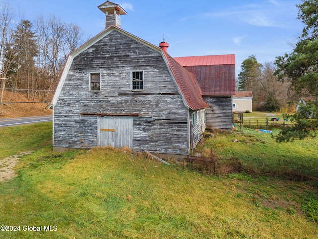 16 Main St, Worcester, NY 12064 - back of property featuring a barn, a gambrel roof, an outdoor structure, and metal roof
