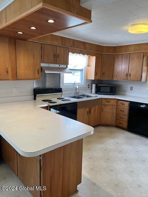 kitchen featuring kitchen peninsula, sink, dishwasher, and white electric range