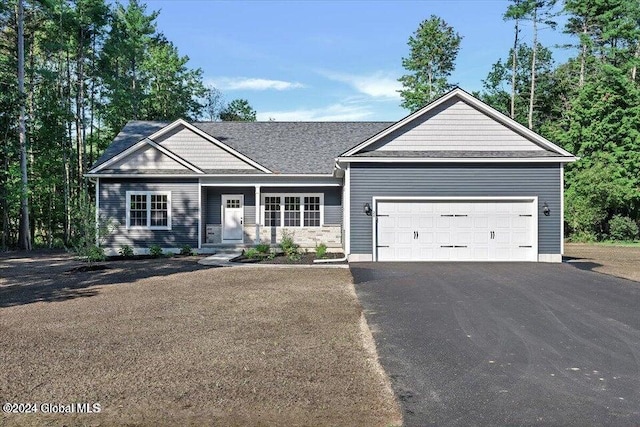 craftsman-style house featuring a garage