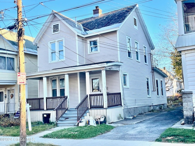 multi unit property featuring a porch