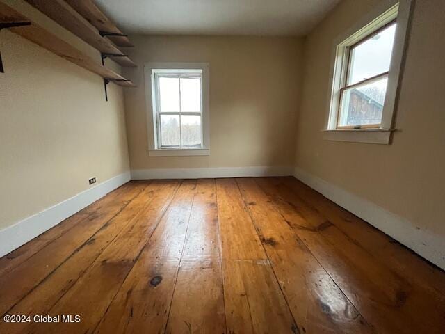 unfurnished room with light hardwood / wood-style flooring