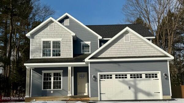 craftsman house with a garage