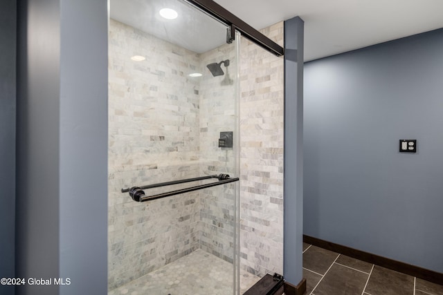 bathroom featuring tile patterned floors and walk in shower