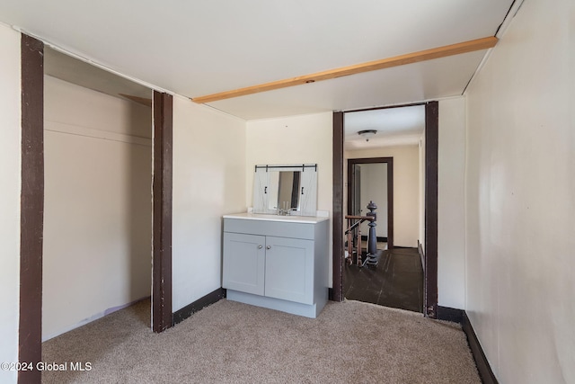 unfurnished bedroom featuring light colored carpet