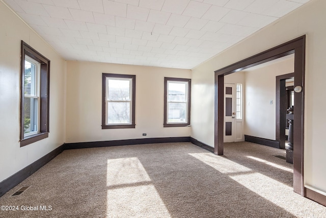 empty room with carpet flooring