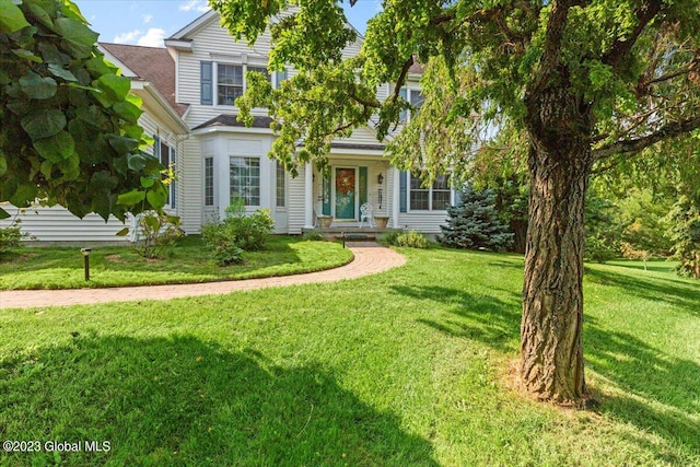 view of front of house with a front lawn