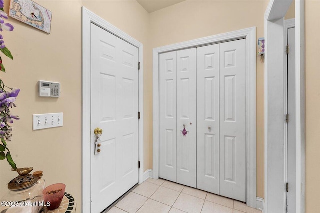 entrance foyer featuring light tile patterned floors