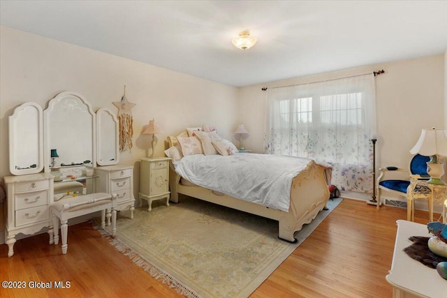 bedroom with light hardwood / wood-style flooring