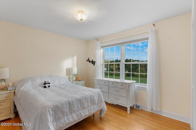 bedroom featuring light hardwood / wood-style floors