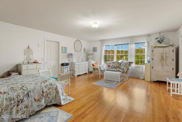 bedroom with light wood-type flooring