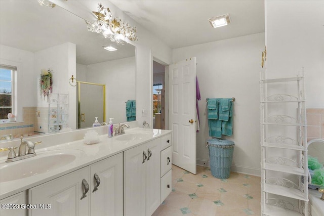 bathroom featuring vanity and walk in shower