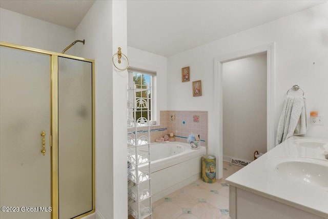 bathroom with tile patterned floors, vanity, and plus walk in shower