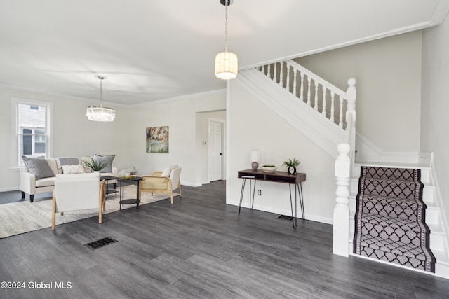 living room featuring dark hardwood / wood-style floors and crown molding