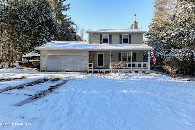 front facade with covered porch and a garage