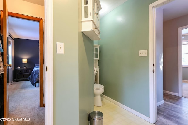 bathroom featuring toilet