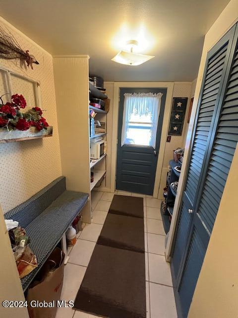 mudroom featuring light tile patterned floors