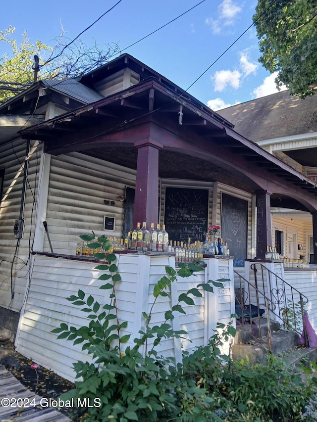 view of home's exterior featuring a porch
