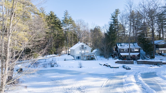 view of yard covered in snow