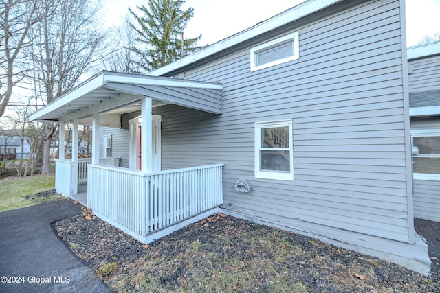 view of home's exterior featuring covered porch