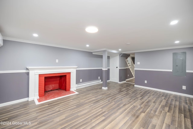 basement with electric panel, a fireplace, dark hardwood / wood-style floors, and ornamental molding