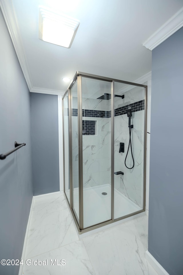 bathroom featuring walk in shower and ornamental molding