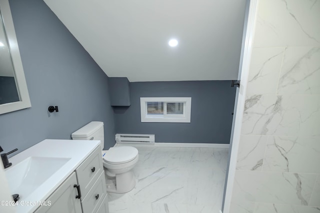 bathroom with vanity, vaulted ceiling, toilet, and a baseboard heating unit