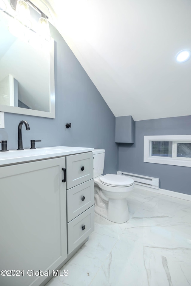 bathroom with toilet, vanity, lofted ceiling, and a baseboard heating unit